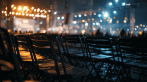 Empty chairs at an outdoor event venue representing the financial risks protected by event cancellation insurance