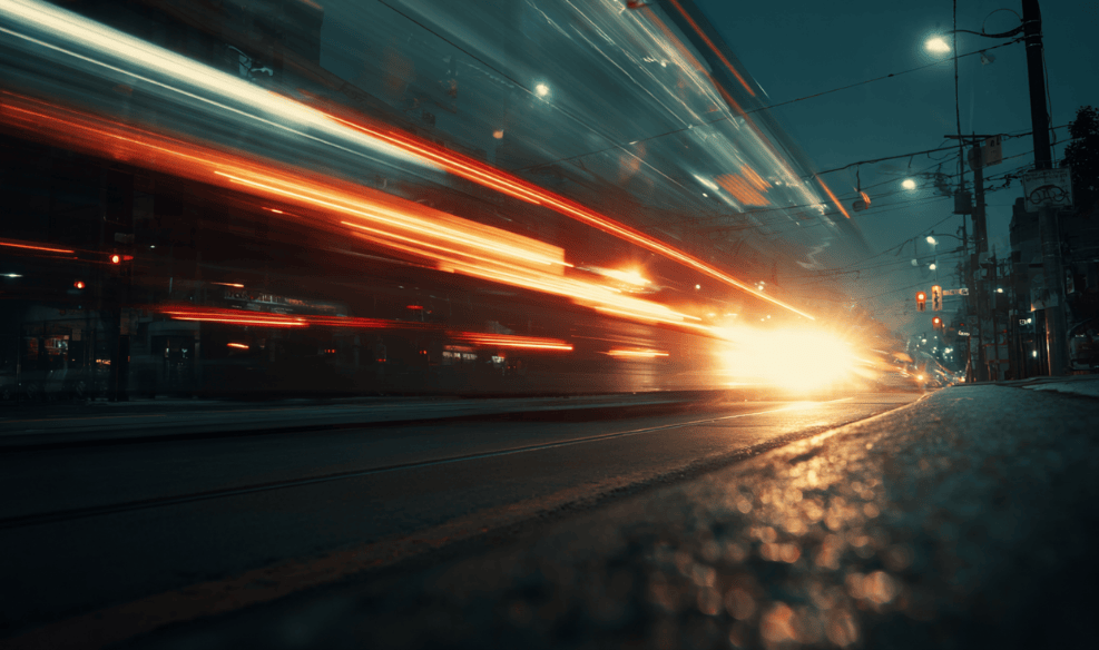 Dynamic city street at night representing the fast-moving world of specialty insurance and risk management.